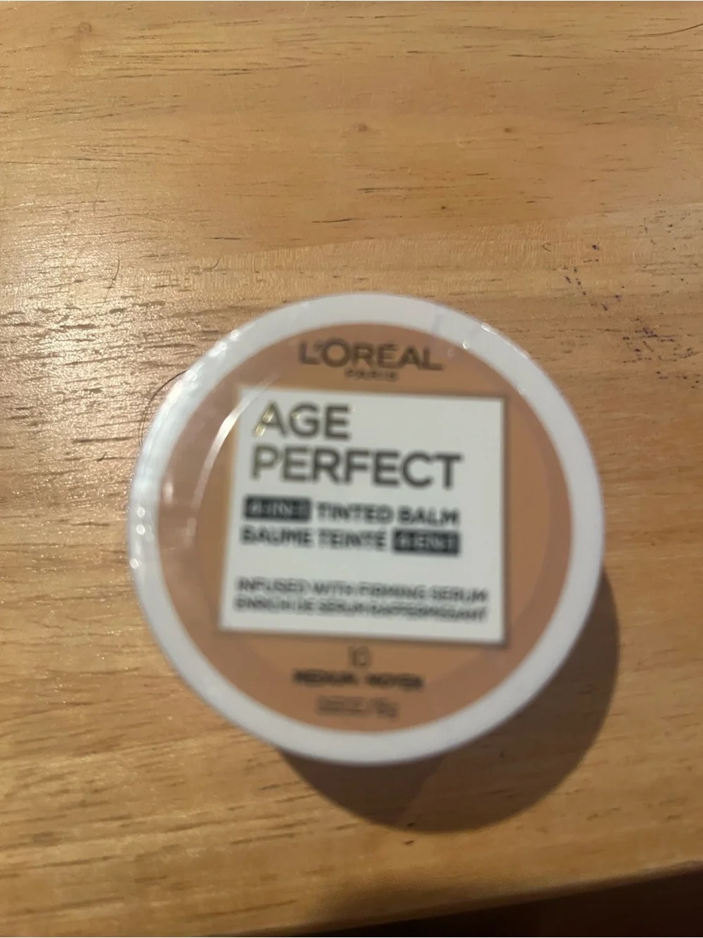 L'Oreal Age Perfect Tinted Balm in beige/white packaging